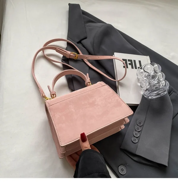 sac à main en velours avec poignet doré