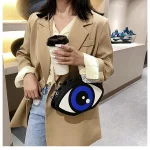 sac bandoulière chic œil qui voit tout