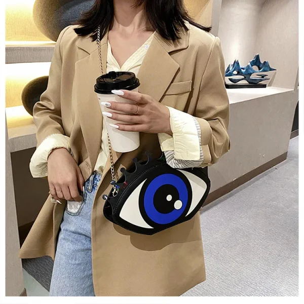 sac bandoulière chic œil qui voit tout