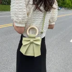 sac à main femme classe avec nœud papillon