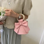 sac à main femme élégant avec nœud papillon