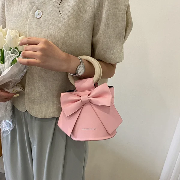 sac à main femme élégant avec nœud papillon