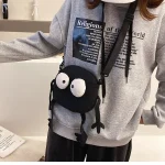 sac noir petit monstre pour Halloween