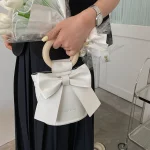 sac à main avec nœud papillon coloré pour femme