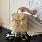 sac à dos avec motifs bohèmes en paille