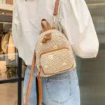 sac à dos aux motifs tropicaux